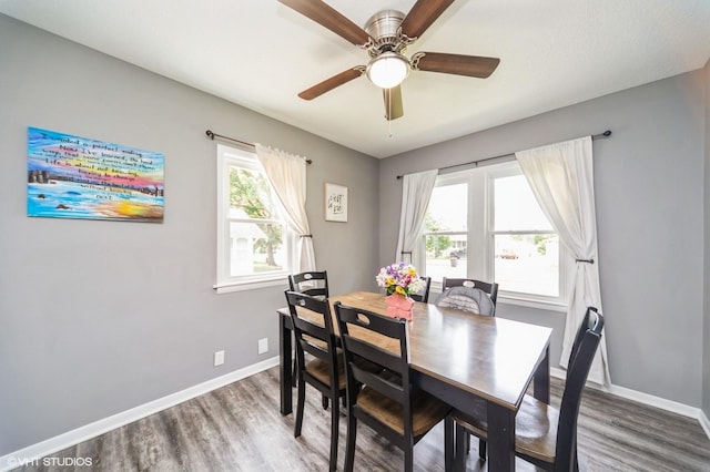 3411 61st St, Des Moines, IA 50322 - dining space with wood finished floors and ceiling fan