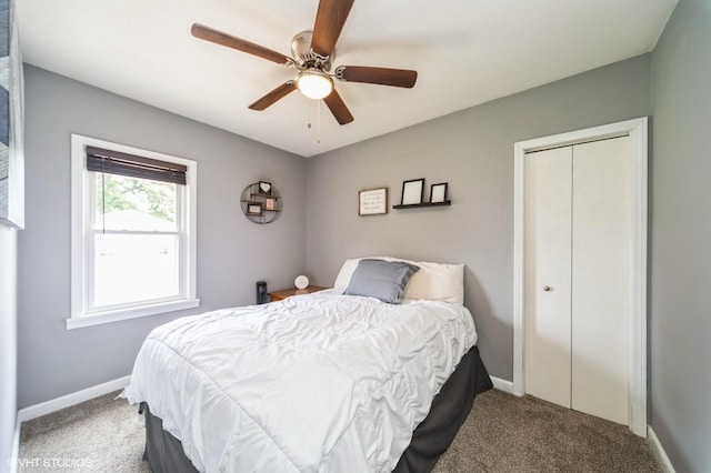 3411 61st St, Des Moines, IA 50322 - carpeted bedroom with a closet and a ceiling fan