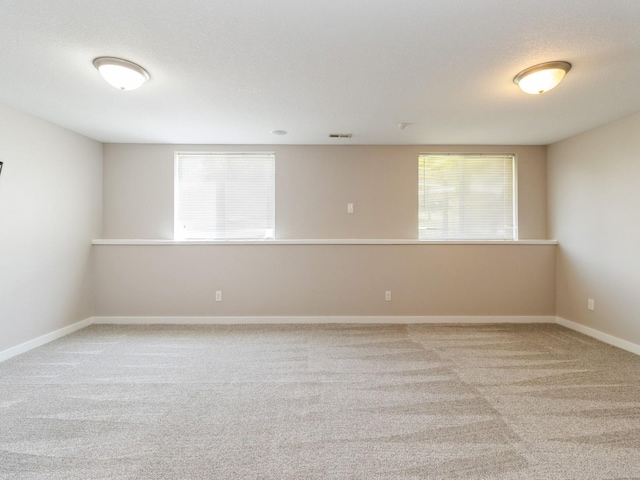 5805 Sterling Trce, Des Moines, IA 50320 - empty room with carpet and baseboards