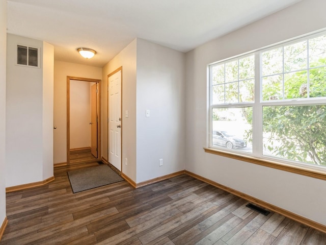 5805 Sterling Trce, Des Moines, IA 50320 - unfurnished room featuring baseboards and wood finished floors