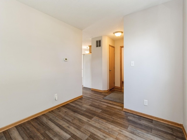 5805 Sterling Trce, Des Moines, IA 50320 - unfurnished room with wood finished floors and baseboards