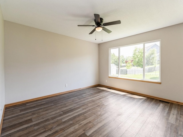 5805 Sterling Trce, Des Moines, IA 50320 - empty room featuring dark wood-style floors and a ceiling fan
