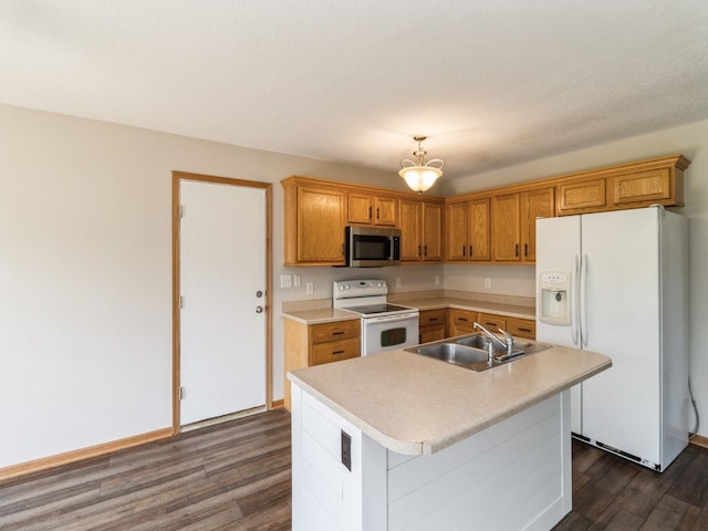5805 Sterling Trce, Des Moines, IA 50320 - kitchen with white appliances, dark wood-type flooring, light countertops, and a center island with sink