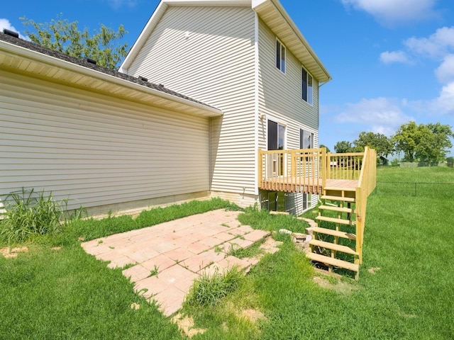 5805 Sterling Trce, Des Moines, IA 50320 - rear view of house with a deck, a yard, a patio, and stairs