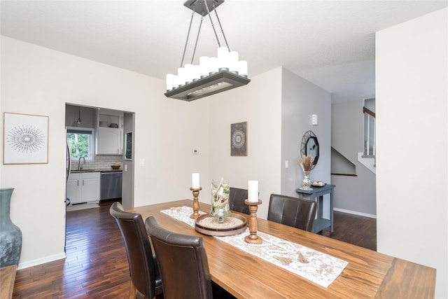 3605 80th St, Urbandale, IA 50322 - dining room with dark wood finished floors and baseboards