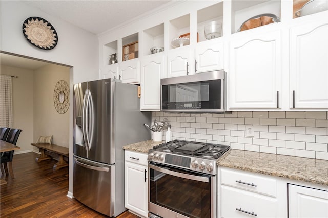 3605 80th St, Urbandale, IA 50322 - kitchen with appliances with stainless steel finishes, backsplash, white cabinets, dark wood-style flooring, and a textured ceiling