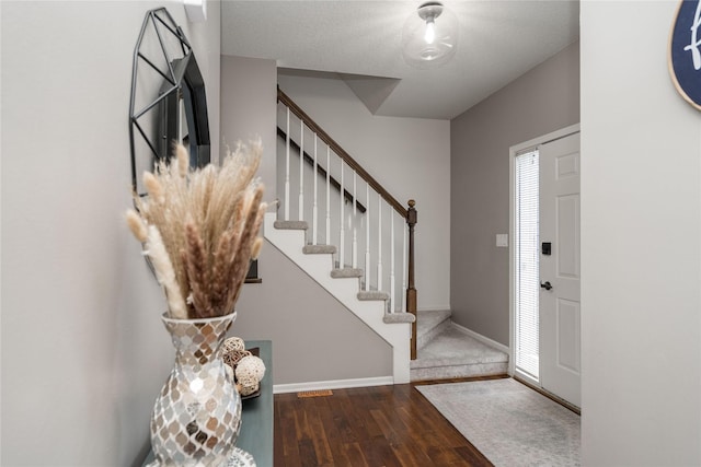 3605 80th St, Urbandale, IA 50322 - foyer entrance with hardwood / wood-style floors and stairs