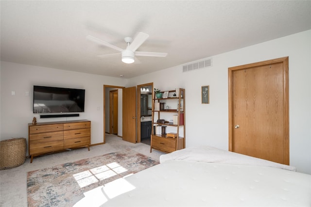 3605 80th St, Urbandale, IA 50322 - bedroom with light carpet and a ceiling fan