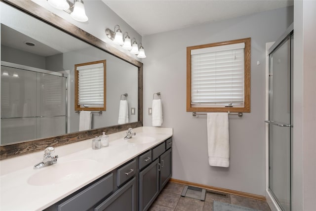 3605 80th St, Urbandale, IA 50322 - full bathroom with double vanity and a shower stall
