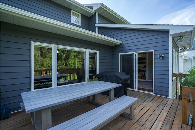 3605 80th St, Urbandale, IA 50322 - wooden deck featuring outdoor dining area