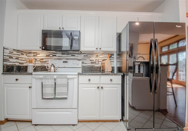 5925 Ep True Pkwy Unit 36, West Des Moines, IA 50266 - kitchen with black appliances, white cabinets, dark stone counters, decorative backsplash, and light tile patterned flooring