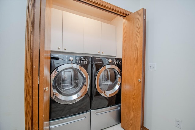 5925 Ep True Pkwy Unit 36, West Des Moines, IA 50266 - washroom featuring washer and dryer and cabinet space