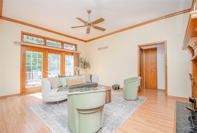 5925 Ep True Pkwy Unit 36, West Des Moines, IA 50266 - living room featuring ceiling fan, wood finished floors, french doors, and ornamental molding