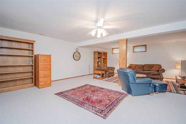 5925 Ep True Pkwy Unit 36, West Des Moines, IA 50266 - carpeted living area featuring a ceiling fan and baseboards