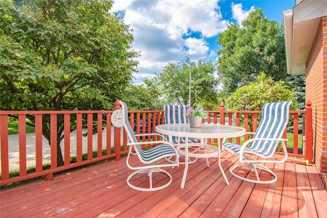 5925 Ep True Pkwy Unit 36, West Des Moines, IA 50266 - wooden terrace featuring outdoor dining area