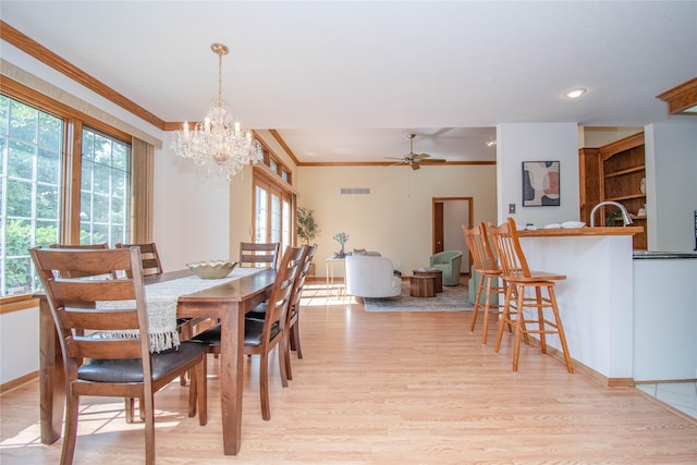 5925 Ep True Pkwy Unit 36, West Des Moines, IA 50266 - dining room featuring light wood-style flooring, healthy amount of natural light, a chandelier, ornamental molding, and recessed lighting