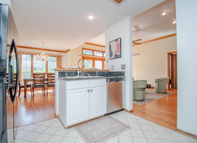 5925 Ep True Pkwy Unit 36, West Des Moines, IA 50266 - kitchen featuring dishwasher, freestanding refrigerator, a chandelier, white cabinets, and ornamental molding