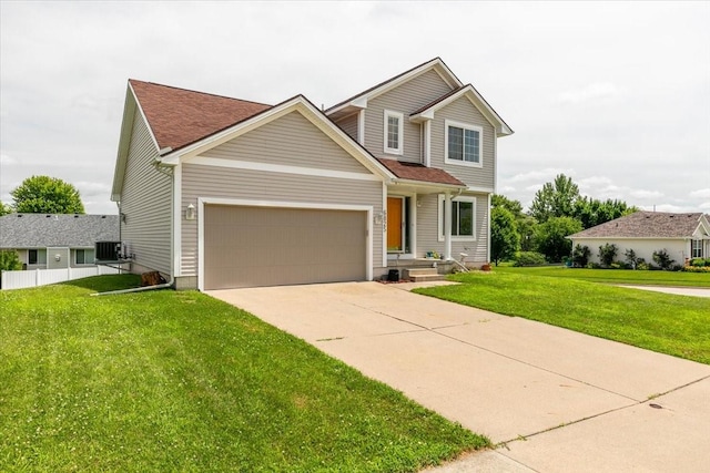 6825 Star View St, Des Moines, IA 50320 - traditional-style house featuring a garage and concrete driveway