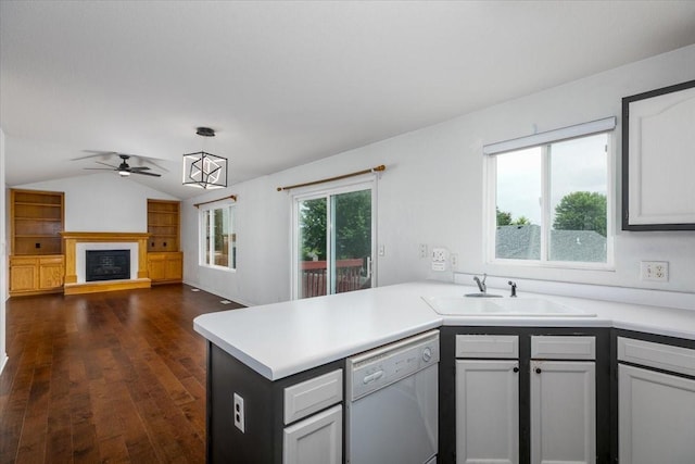 6825 Star View St, Des Moines, IA 50320 - kitchen featuring dishwasher, a peninsula, a ceiling fan, light countertops, and vaulted ceiling