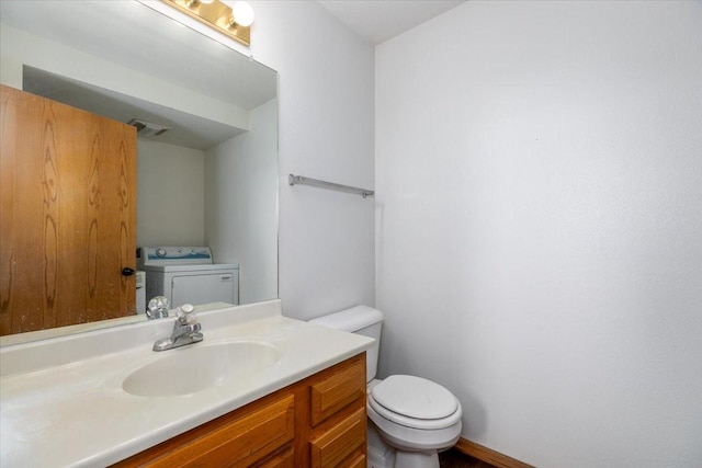 6825 Star View St, Des Moines, IA 50320 - bathroom featuring washer / clothes dryer and vanity