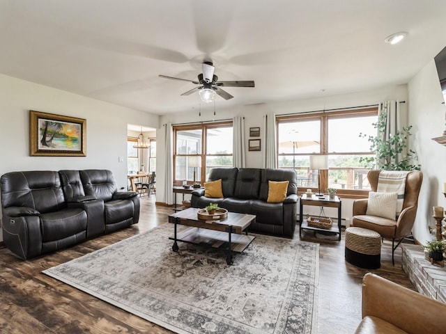 4791 Erbe St, Norwalk, IA 50211 - living room featuring ceiling fan, plenty of natural light, dark wood finished floors, a chandelier, and recessed lighting