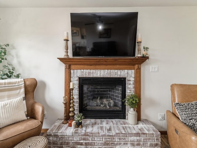 4791 Erbe St, Norwalk, IA 50211 - detailed view of a brick fireplace and wood finished floors