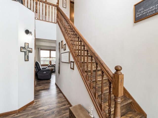 4791 Erbe St, Norwalk, IA 50211 - stairs featuring wood finished floors and a high ceiling