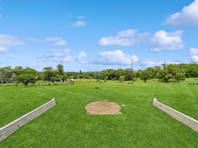 4791 Erbe St, Norwalk, IA 50211 - view of green lawn featuring a view of countryside