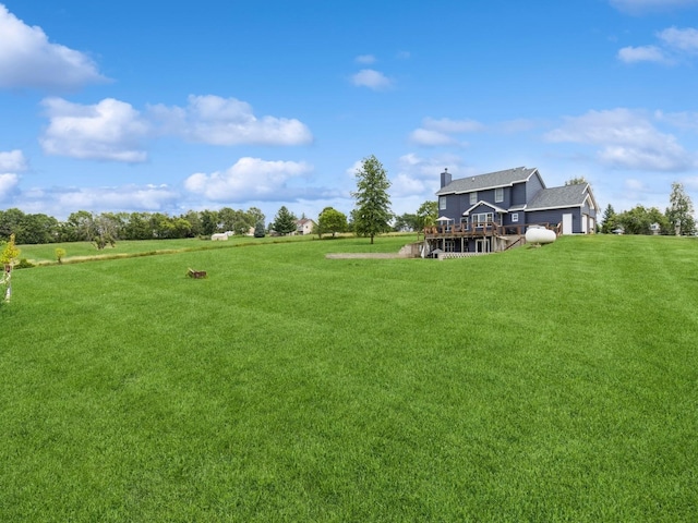 4791 Erbe St, Norwalk, IA 50211 - view of grassy yard featuring a deck
