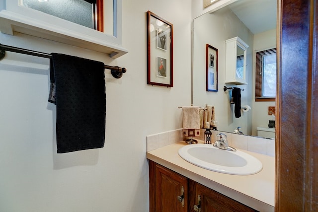 1116 42nd St, West Des Moines, IA 50266 - bathroom featuring vanity and toilet