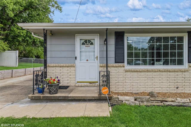 1212 Burnham Ave, Des Moines, IA 50315 - view of exterior entry with brick siding