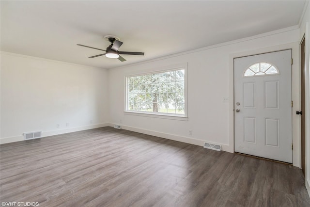 1212 Burnham Ave, Des Moines, IA 50315 - entrance foyer with plenty of natural light, a ceiling fan, wood finished floors, and crown molding