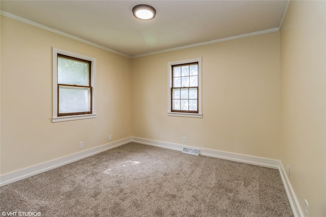1212 Burnham Ave, Des Moines, IA 50315 - unfurnished room with carpet floors and crown molding