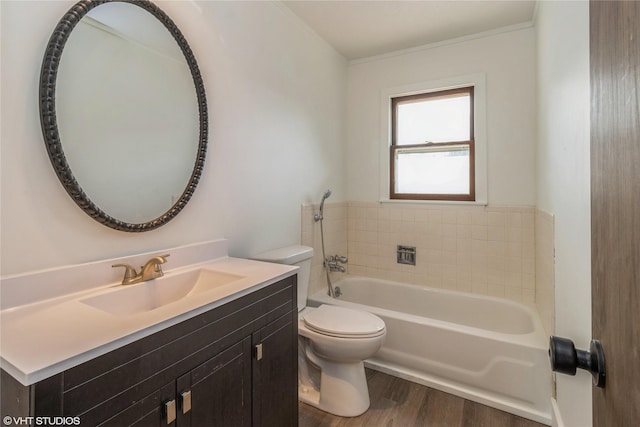 1212 Burnham Ave, Des Moines, IA 50315 - bathroom featuring a tub to relax in, wood finished floors, and vanity