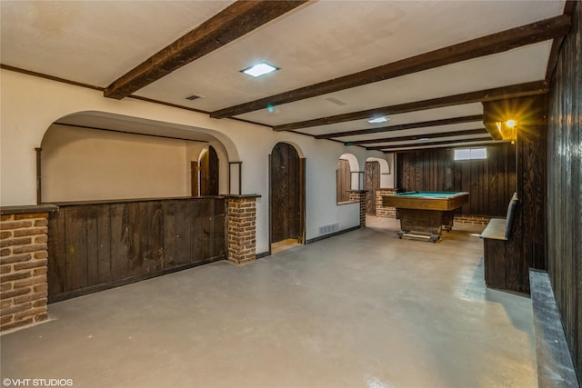 1212 Burnham Ave, Des Moines, IA 50315 - basement with arched walkways, pool table, and wood walls