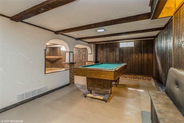 1212 Burnham Ave, Des Moines, IA 50315 - rec room featuring arched walkways, concrete floors, beamed ceiling, wood walls, and billiards table