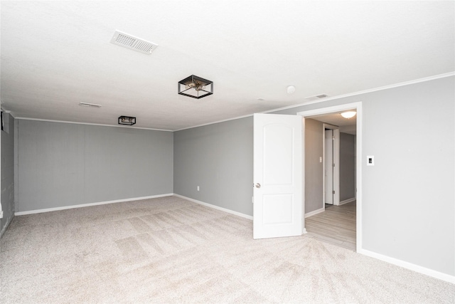 2512 Boston Ave, Des Moines, IA 50310 - empty room featuring light colored carpet and crown molding