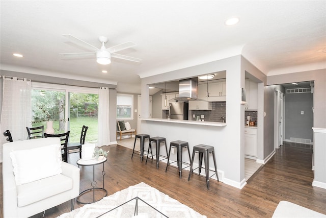 2512 Boston Ave, Des Moines, IA 50310 - living room featuring a ceiling fan, dark wood finished floors, and recessed lighting