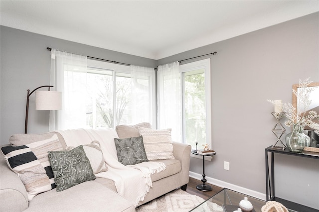 2512 Boston Ave, Des Moines, IA 50310 - living area featuring baseboards and wood finished floors