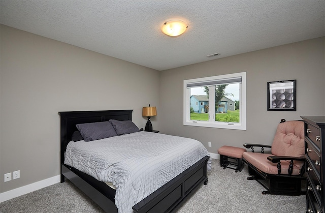 685 Indian Ridge Dr, Waukee, IA 50263 - bedroom featuring light carpet and a textured ceiling