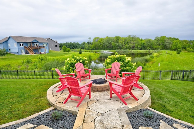 685 Indian Ridge Dr, Waukee, IA 50263 - view of patio / terrace with an outdoor fire pit and a water view