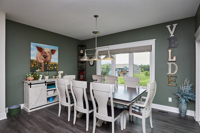 685 Indian Ridge Dr, Waukee, IA 50263 - dining room featuring dark wood finished floors and baseboards