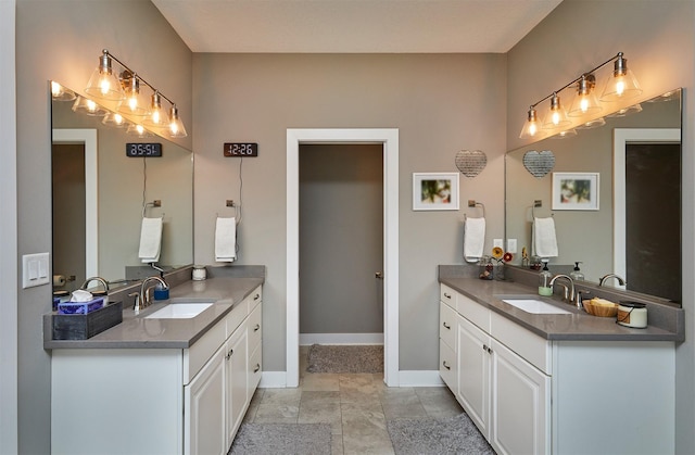 685 Indian Ridge Dr, Waukee, IA 50263 - full bathroom with two vanities