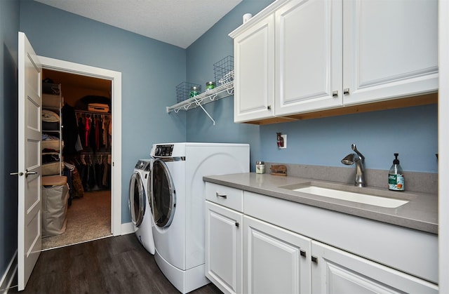 685 Indian Ridge Dr, Waukee, IA 50263 - laundry room with cabinet space, dark wood finished floors, and independent washer and dryer