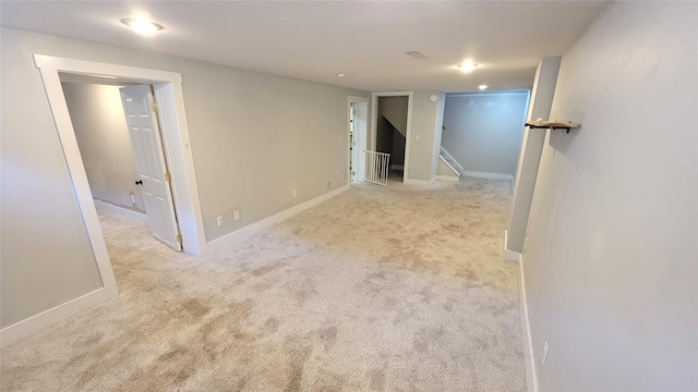 623 E 18th St N, Newton, IA 50208 - carpeted empty room with baseboards