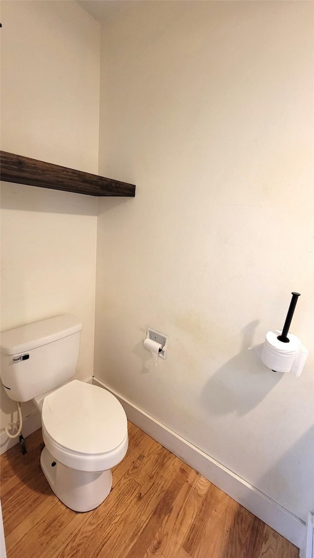623 E 18th St N, Newton, IA 50208 - bathroom featuring wood finished floors and baseboards