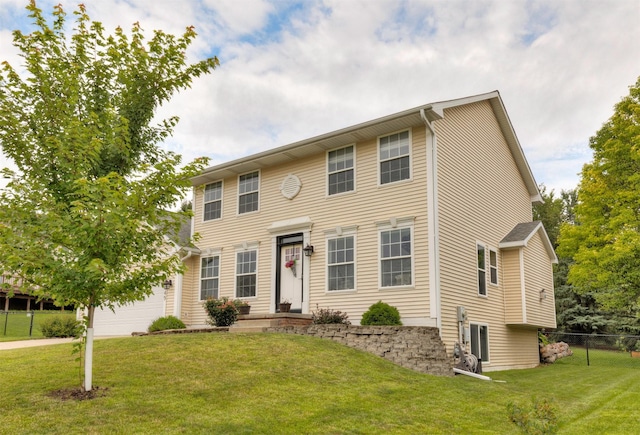 14449 Briarwood Ln, Urbandale, IA 50323 - colonial-style house featuring driveway and an attached garage