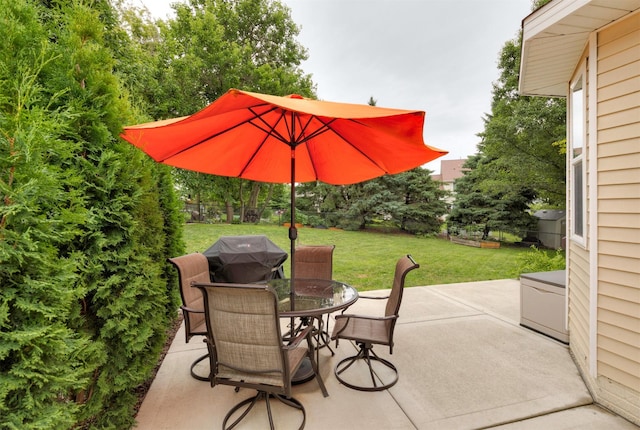 14449 Briarwood Ln, Urbandale, IA 50323 - view of patio / terrace featuring outdoor dining area and area for grilling
