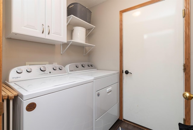 14449 Briarwood Ln, Urbandale, IA 50323 - washroom featuring washer and clothes dryer and cabinet space