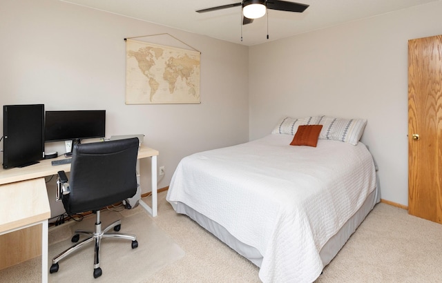 14449 Briarwood Ln, Urbandale, IA 50323 - bedroom with light colored carpet, an office area, and ceiling fan